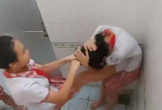 Xôn xao clip nữ sinh bị bạn đánh trong nhà vệ sinh  trường học